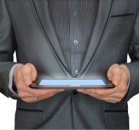 man holding tablet