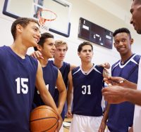 basketball players and coach