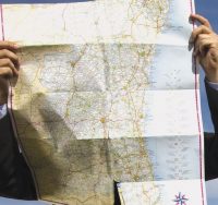 man reading map